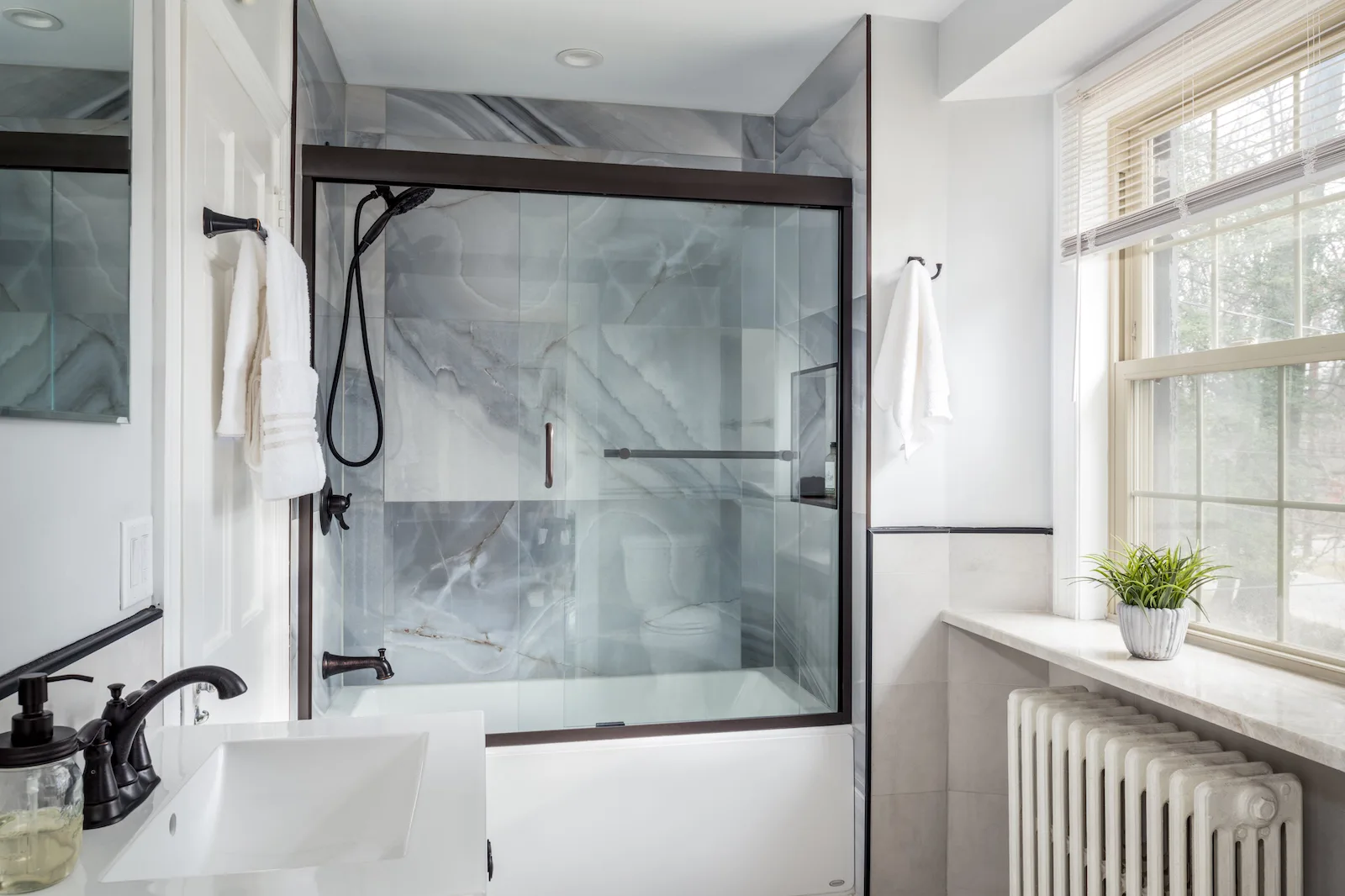Shower with glass sliding doors in bathroom remodel in philadelphia