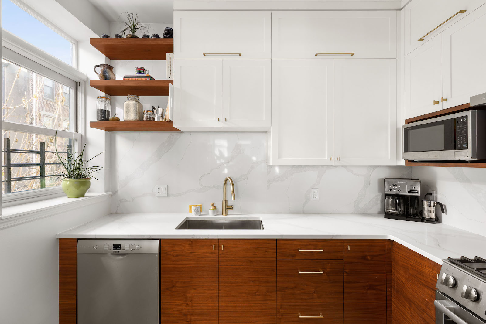 brooklyn kitchen with walnut and white cabinets and quartz backsplash bedford-stuyvesant