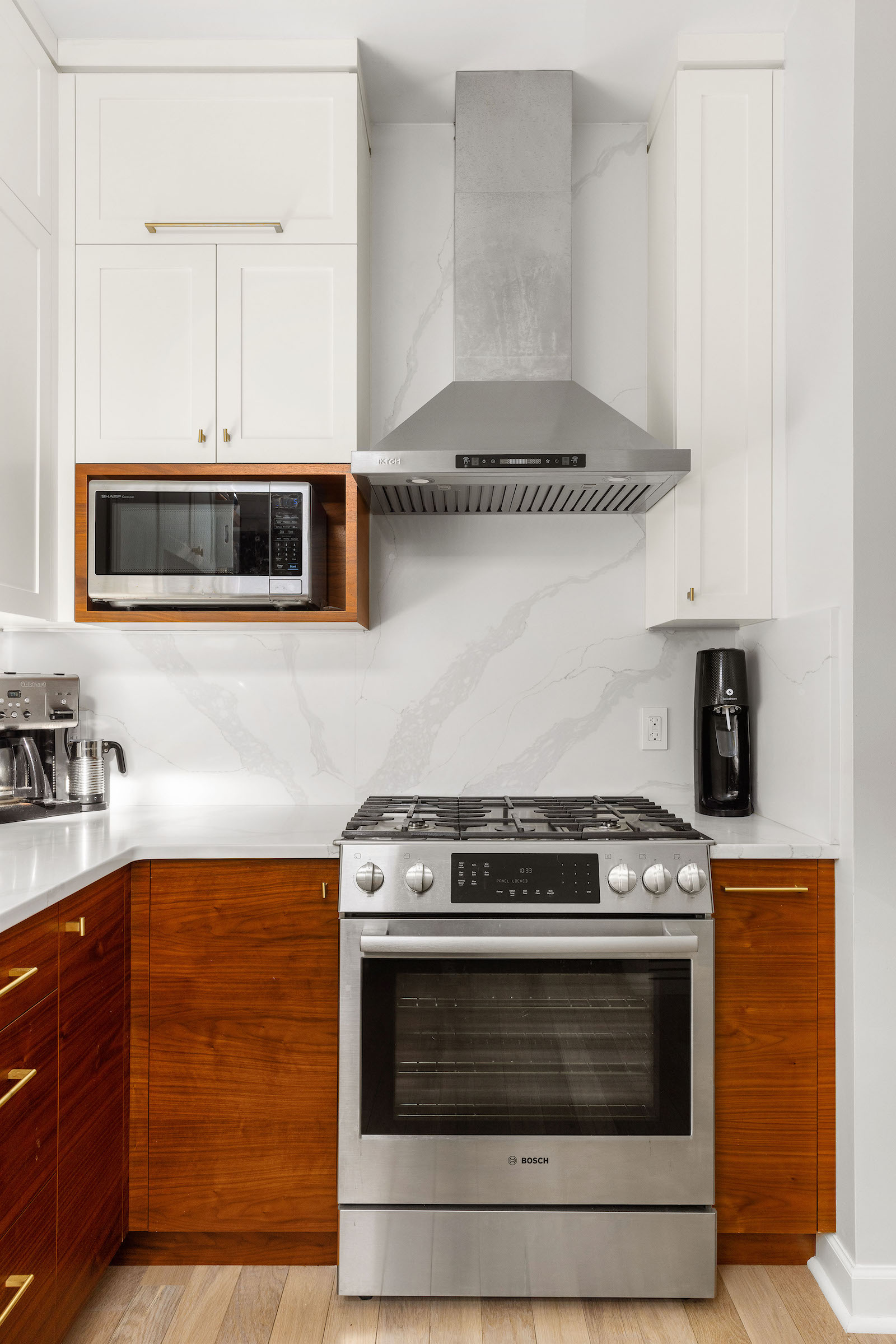 brooklyn kitchen with walnut microwave cabinets and quartz backsplash bedford-stuyvesant