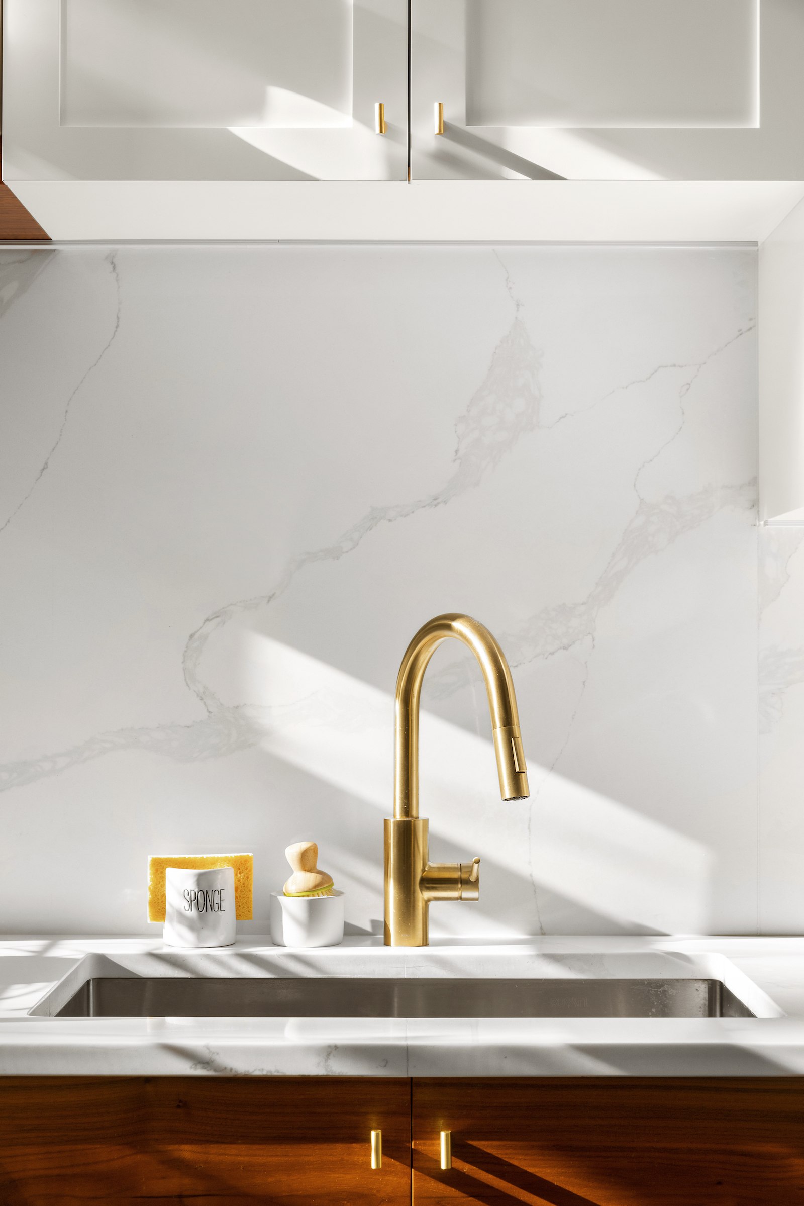 brooklyn kitchen remodel with gold faucet quartz backsplash and countertop bedford-stuyvesant