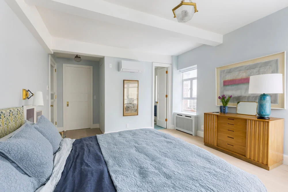 bedroom remodel with blue walls