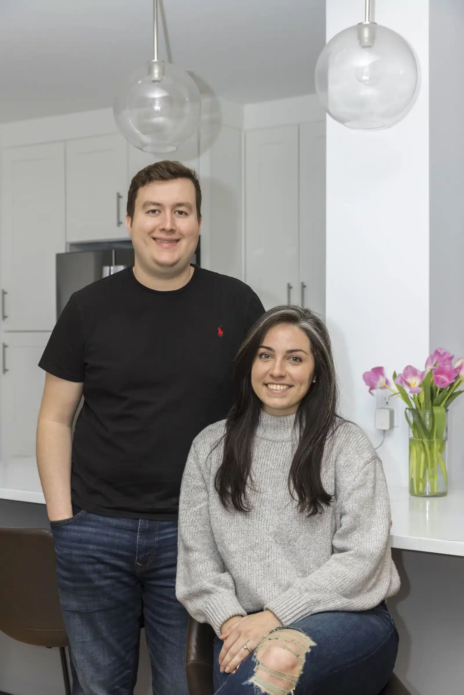 portrait of homeowners in remodeled brooklyn kitchen