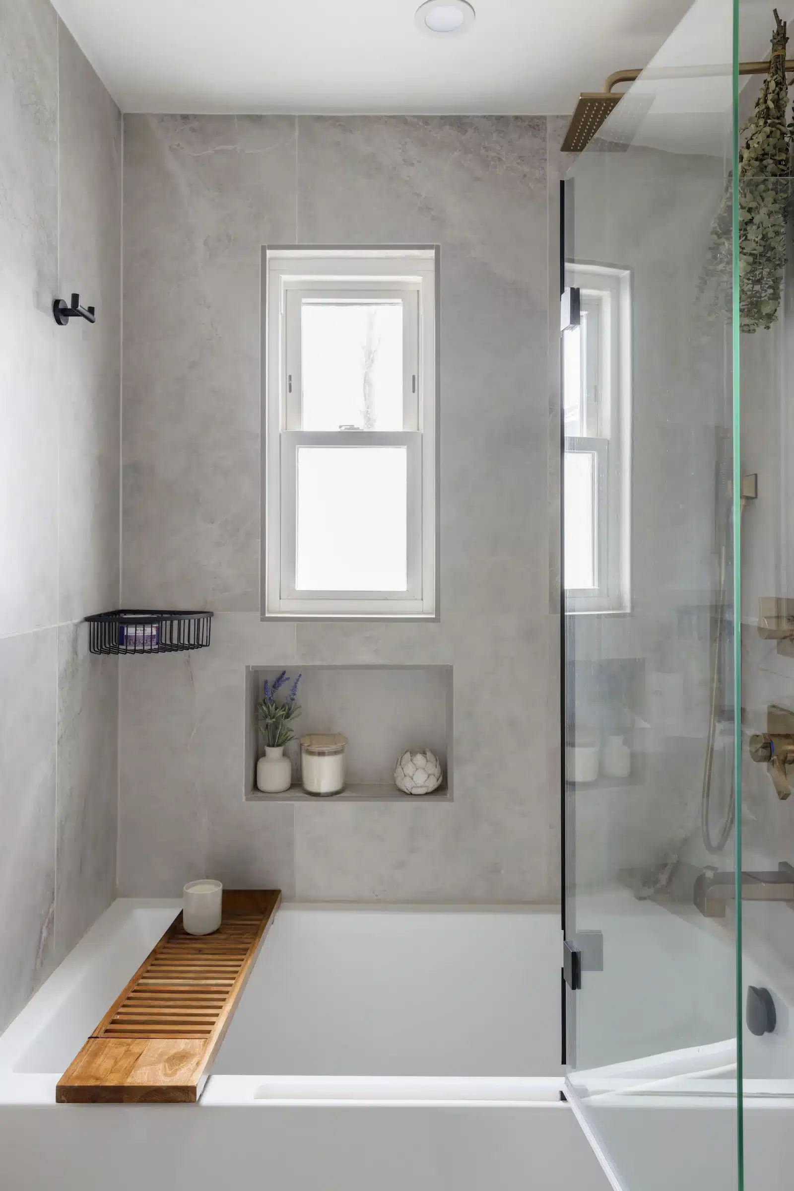 bathroom with honed shower tile tub and glass panel in home remodel in rosedale