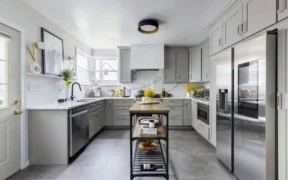 greige gray kitchen cabinets in home remodel in rosedale