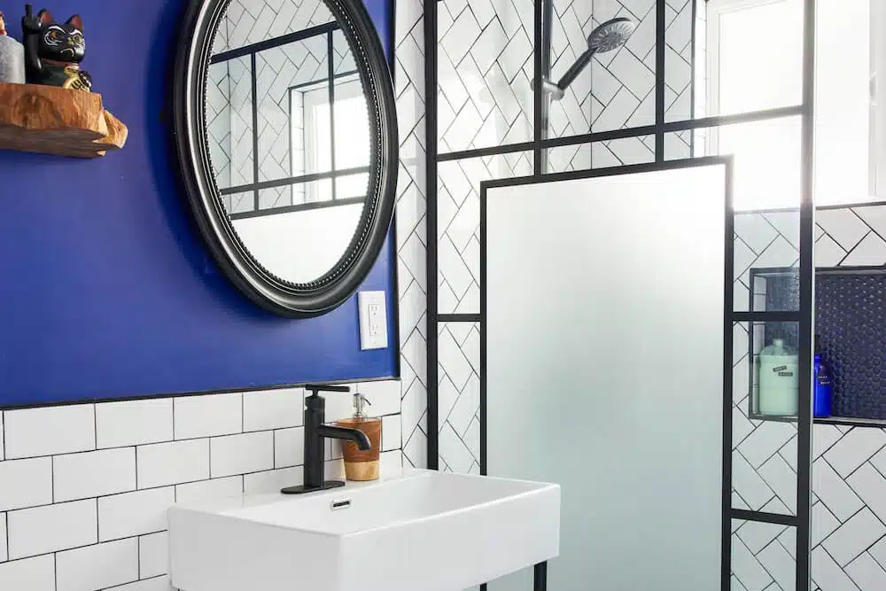Bathroom remodel in Glassell Park Los Angeles with black, white and blue color palette