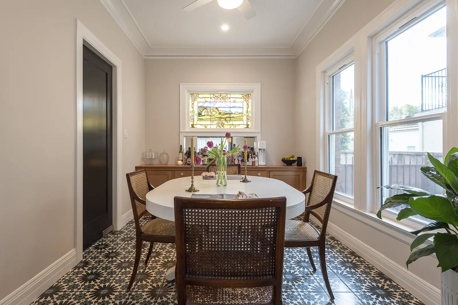 dining area with patterned floor tile in home remodel in mid city