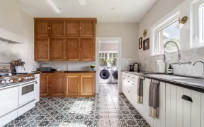 kitchen with patterned floor tile in home remodel in mid city