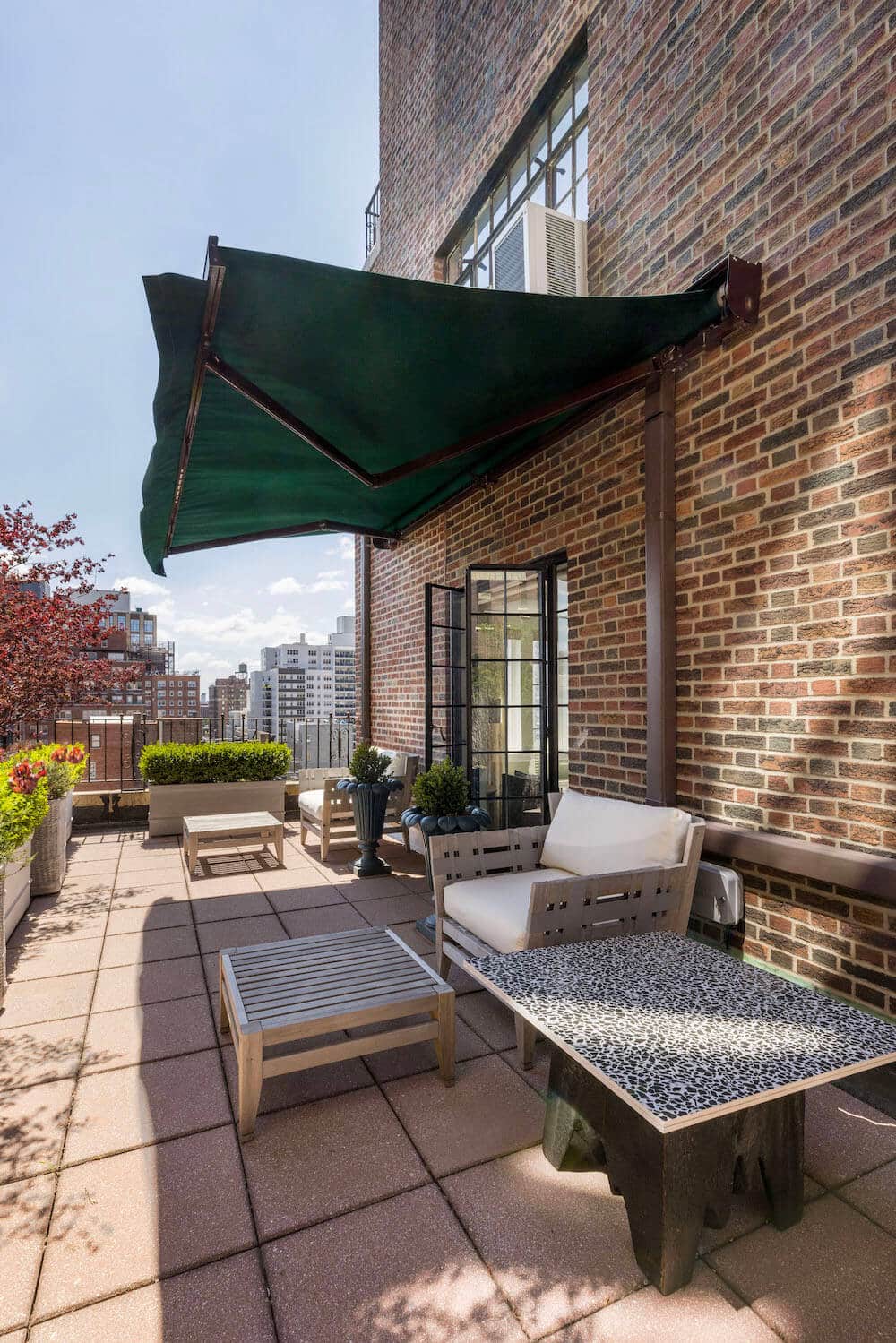 outdoor space terrace with green awning