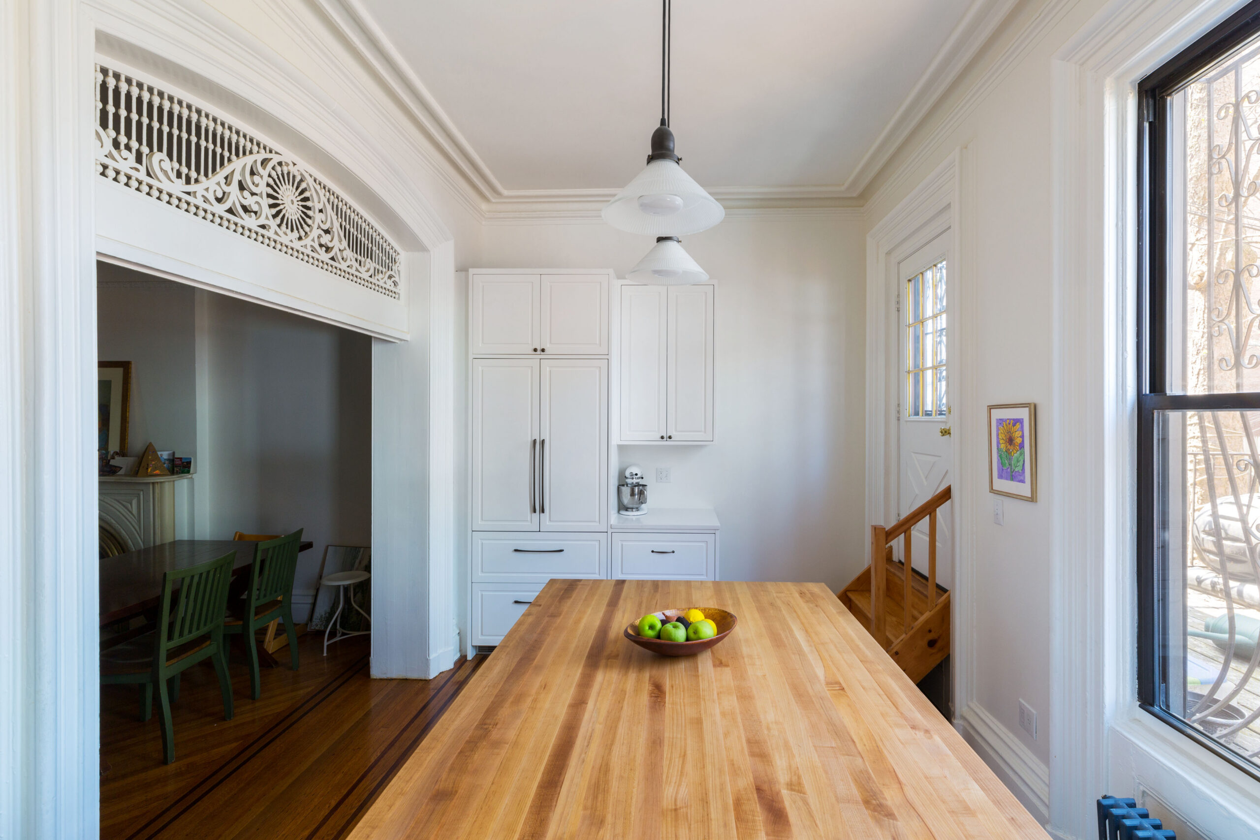 A reworked kitchen in an older addition that opened up the back of her Brooklyn townhouse for cooking and dining